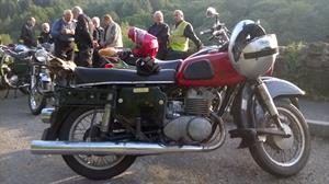 Harry's MZ. A few years ago, it was badly damaged when he was knocked off it.  Within 2 weeks, he had rebuilt it and took it to Italy!