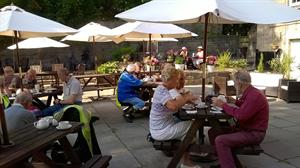 And relaxing in the sunlit courtyard at the end