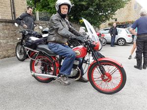 Dennis sets out on his 1953 Bantam.