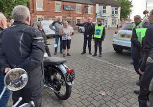 Kate addresses the riders alongside Malcolm, our leader.