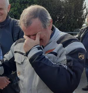 Mick Gather hands over his donation